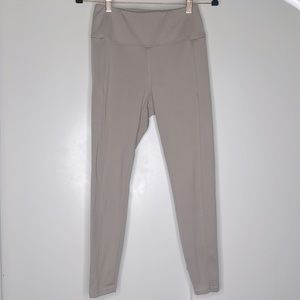 Danskin light taupe stone color sueded feel leggings. worn a couple times size M